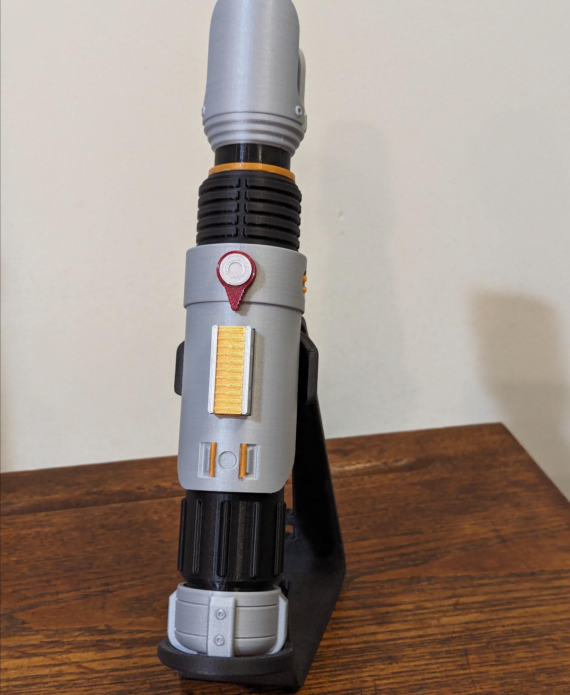 Sabine Wren’s Collapsing Lightsaber - Filaments used:

Polymaker_3D PolyLite Metallic Silver

PrintedSolid Black

AtomicFilament Dark Cherry Red and True Gold

ZIRO3DFILAMENT Transparent Green

Printed on Prusa MK3.5 - 3d model